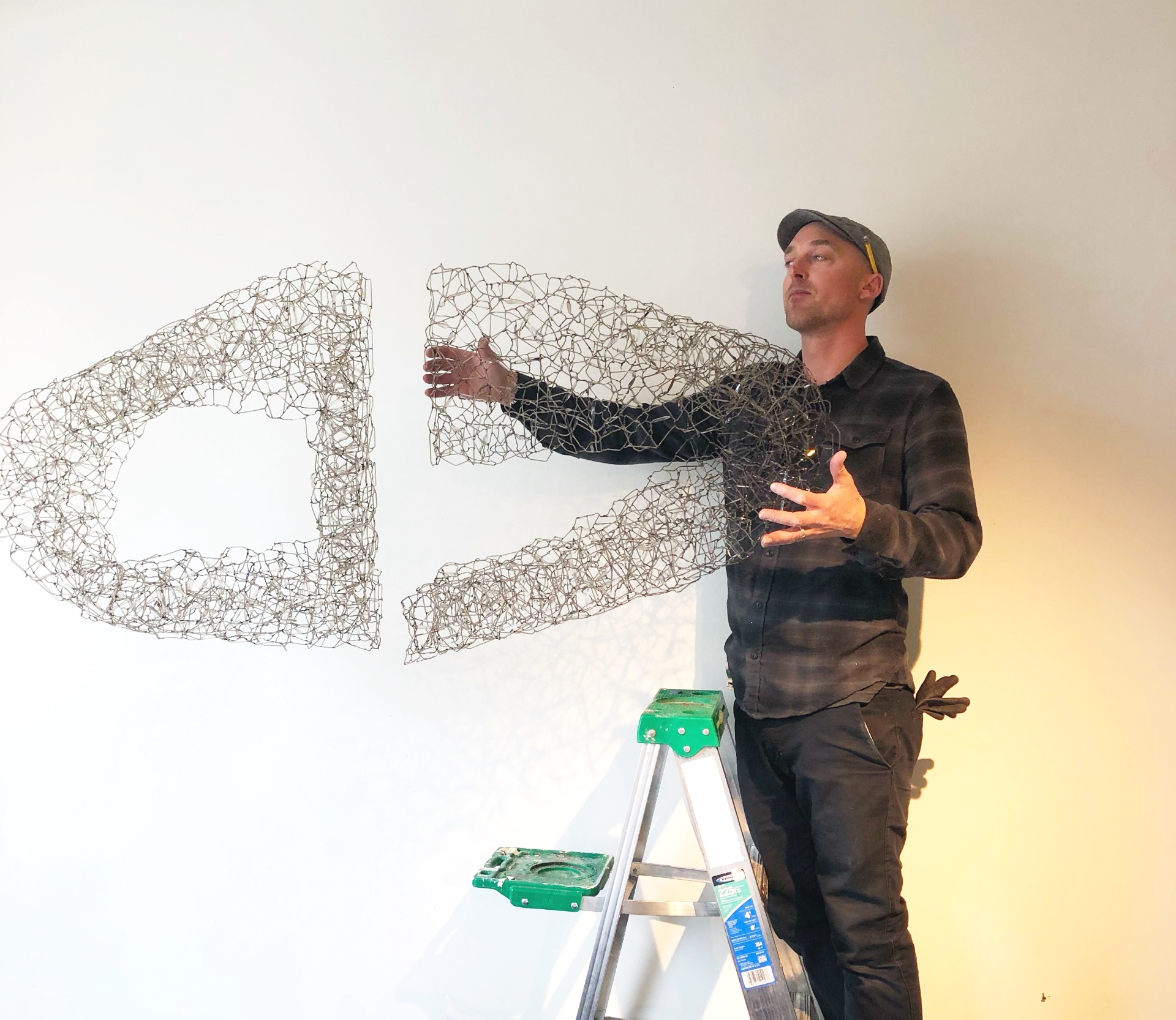 Installing a large sculptural artwork for a Hemmings Gallery collector